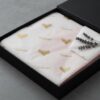 Personalized white tissue paper with gold print for upscale boutique unboxing