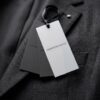 Customized fashion apparel labels with ribbon attachment