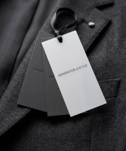 Customized fashion apparel labels with ribbon attachment