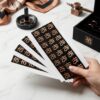 Custom eco-friendly black logo adhesive sticker rolls